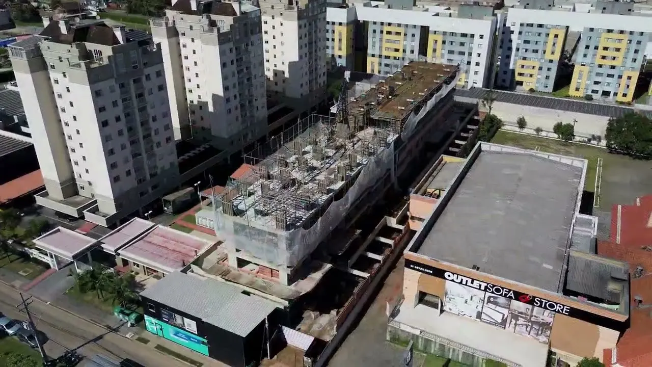 Vista aérea da obra do Jockey City Habitat — Abril de 2026